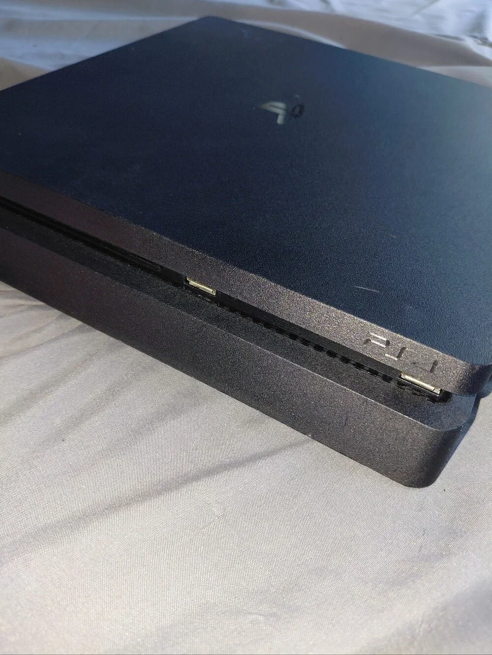 Sony PS4 Slim in Black with Bright Blue DualShock Controller and Game Bundle